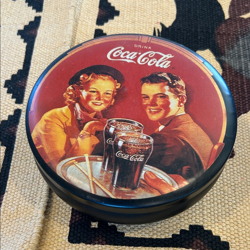 Coca-Cola Red and Black 1988 Round Tin with Couple Illustration